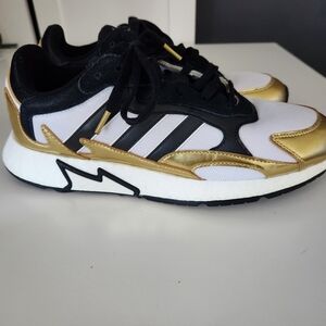 Adidas Tresc Run shoes in 'Black Metallic Gold' colorway, model EG5661 Men's 10